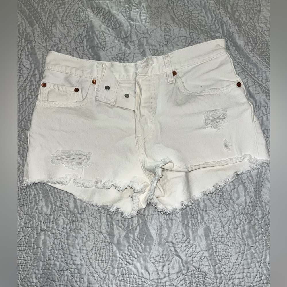 White Levi denim shorts with distressing (size 26)